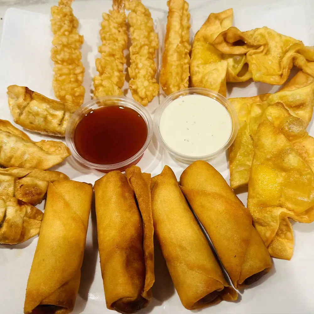 Potstickers, springs, crab puffs, tempura shrimps